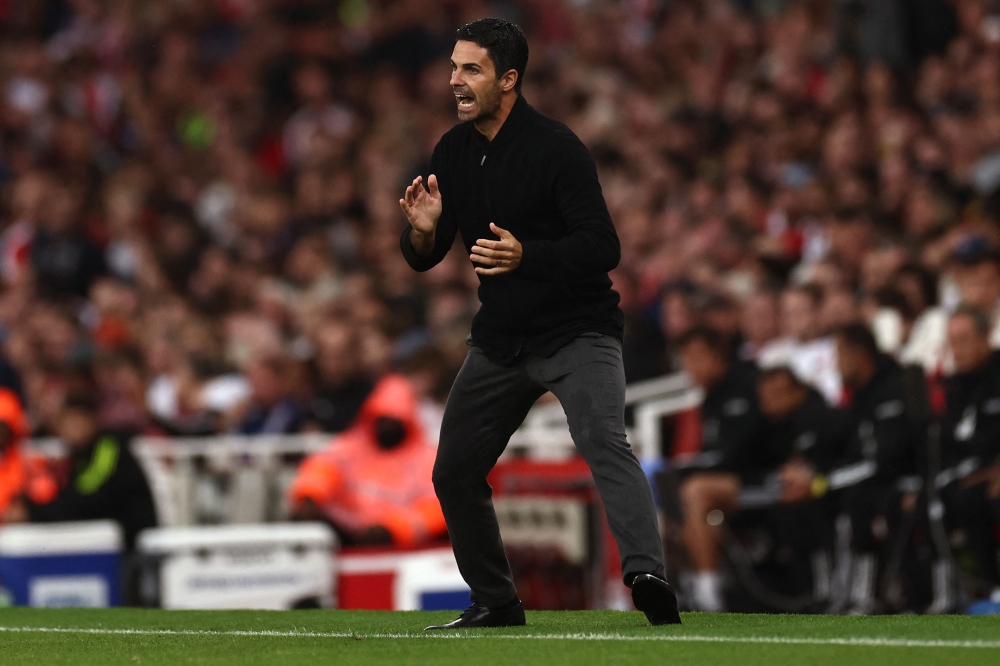Arsenal's Spanish manager Mikel Arteta reacts during the English Premier League football match between Arsenal and Fulham at the Emirates Stadium in London on August 26, 2023. (Photo by HENRY NICHOLLS / AFP)