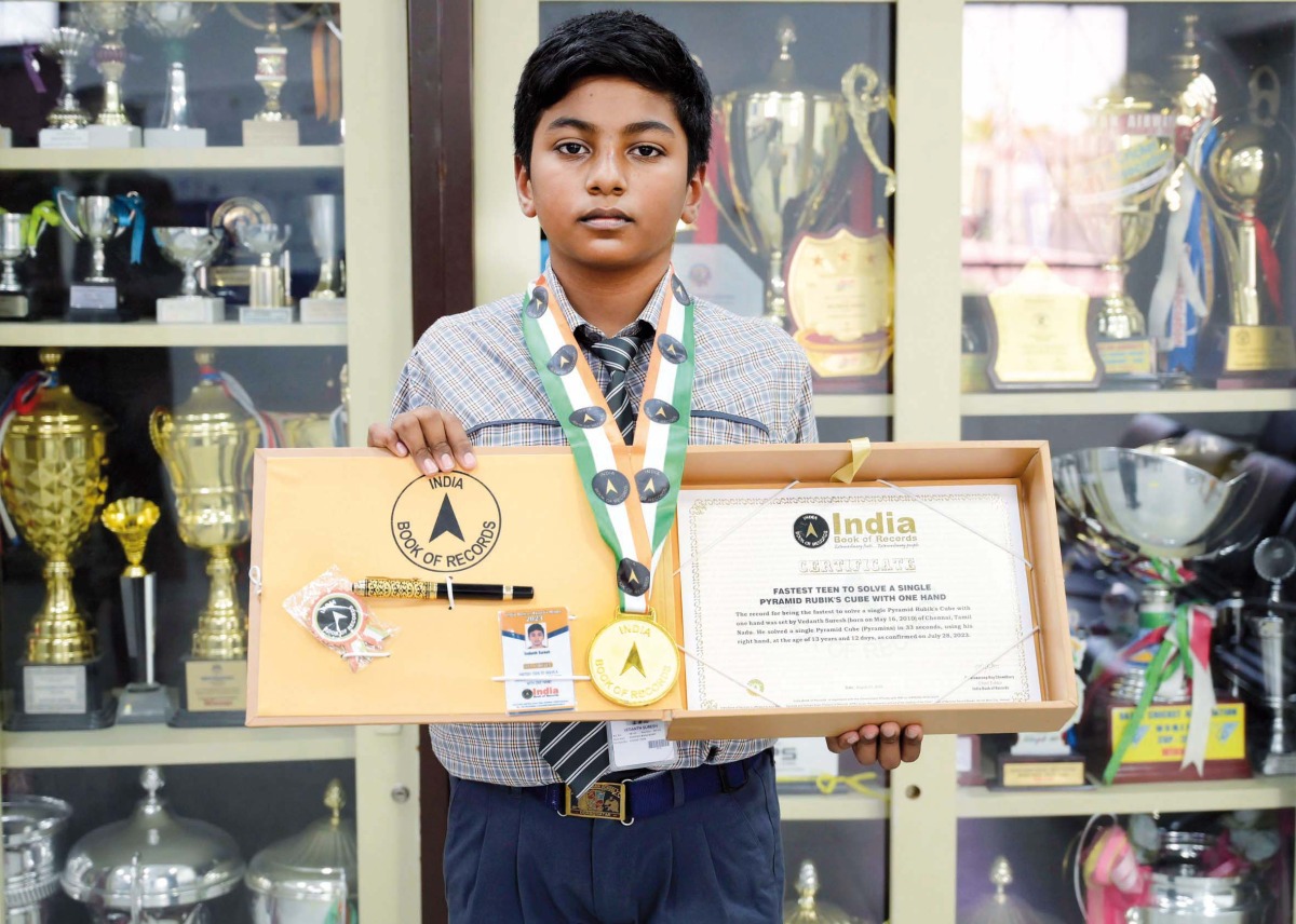 Vedant Suresh with his award.
