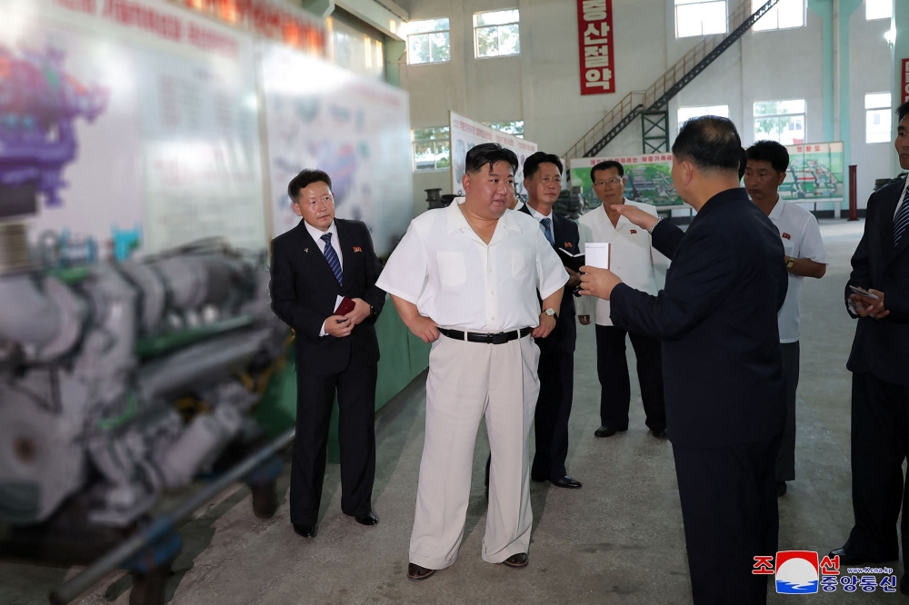 This undated picture released from North Korea's official Korean Central News Agency (KCNA) on September 3, 2023 shows North Korean leader Kim Jong Un inspecting the Pukjung Machine Complex in North Pyongan Province. (Photo by KCNA VIA KNS / AFP) /