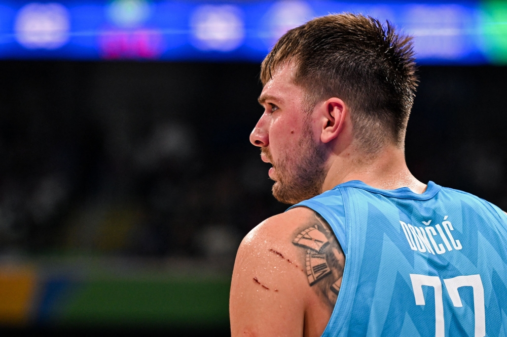 Slovenia's Luka Doncic reacts during the FIBA Basketball World Cup quarter-final match between Canada and Slovenia at the Mall of Asia Arena in Manila on September 6, 2023. (Photo by SHERWIN VARDELEON / AFP)
