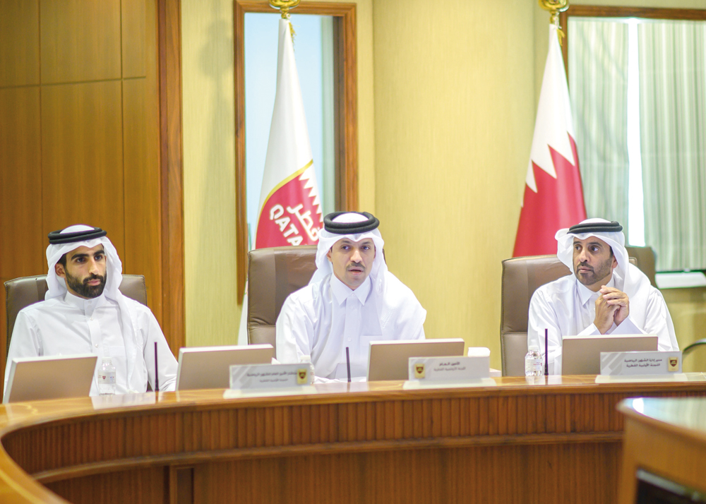Secretary-General of the Qatar Olympic Committee (QOC) Jassim bin Rashid Al Buainain (centre) during a meeting with Qatari sports federations officials at the QOC Headquarters, yesterday. 
