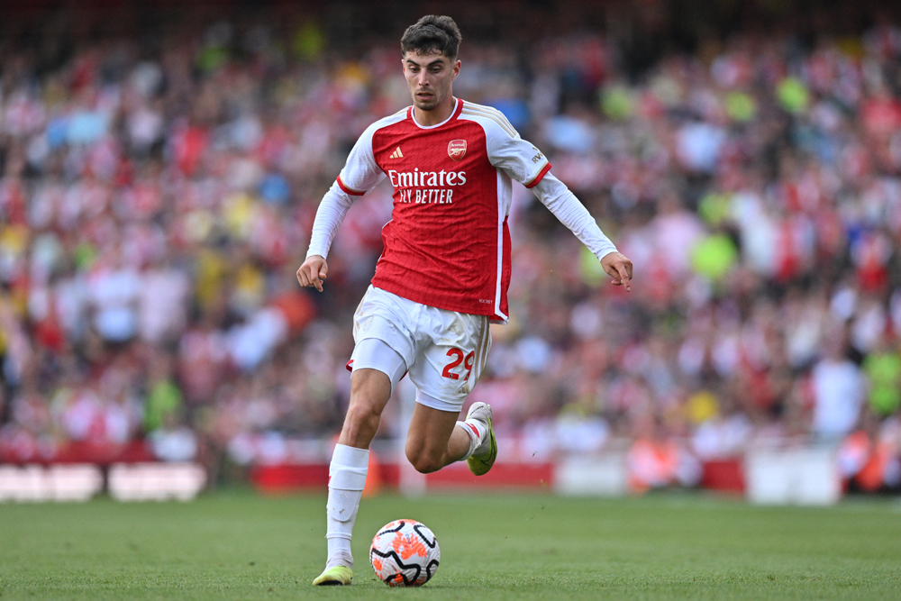 Arsenal's German midfielder #29 Kai Havertz runs with the ball during the English Premier League football match between Arsenal and Manchester United at the Emirates Stadium in London on September 3, 2023. (Photo by Glyn KIRK / AFP) 
