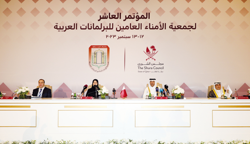 Deputy Speaker of the Shura Council H E Dr. Hamda bint Hassan Al Sulaiti (second left); President of the Association of Secretaries-General of Arab Parliaments H E Dr. Ahmed bin Nasser Al Fadala (second right); and other officials at the opening of the conference yesterday. PIC: Salim Matramkot/The Peninsula