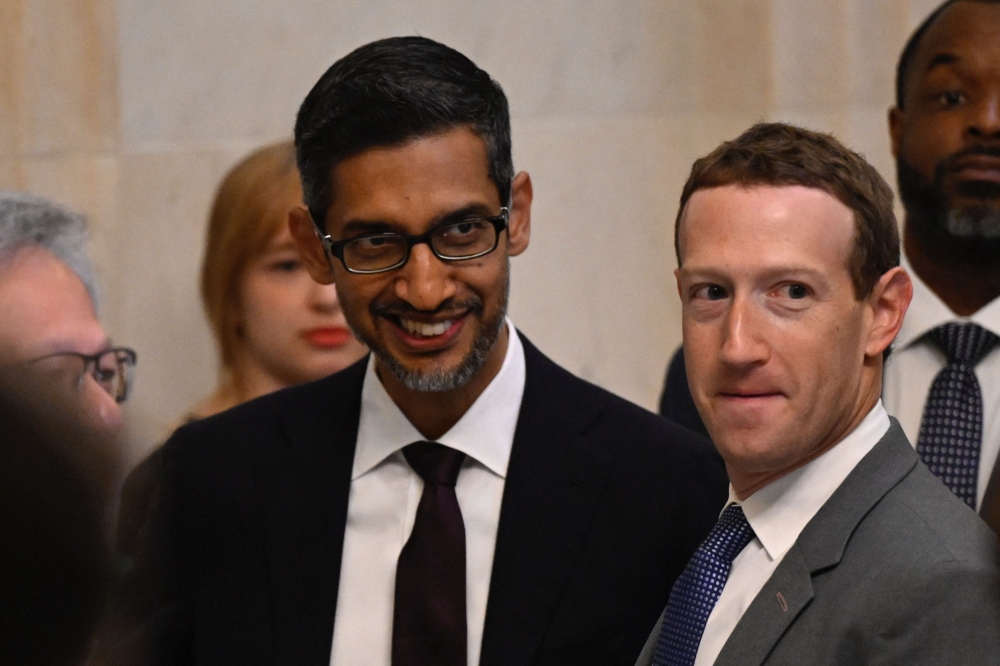 Mark Zuckerberg (right), CEO of Meta, and Google CEO Sundar Pichai, arrive for a US Senate bipartisan Artificial Intelligence (AI) Insight Forum at the US Capitol in Washington, DC, on September 13, 2023. (Photo by Andrew Caballero-Reynolds / AFP)