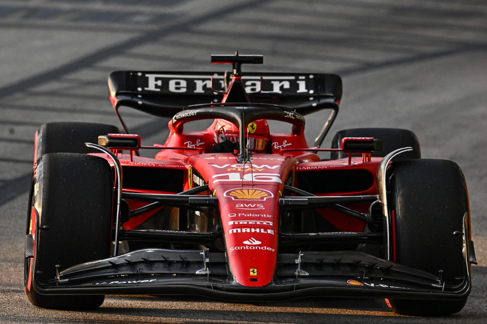 Ferrari's Monegasque driver Charles Leclerc drives during the first practice session of the Singapore Formula One Grand Prix night race at the Marina Bay Street Circuit in Singapore on September 15, 2023. (Photo by Lillian Suwanrumpha / AFP)