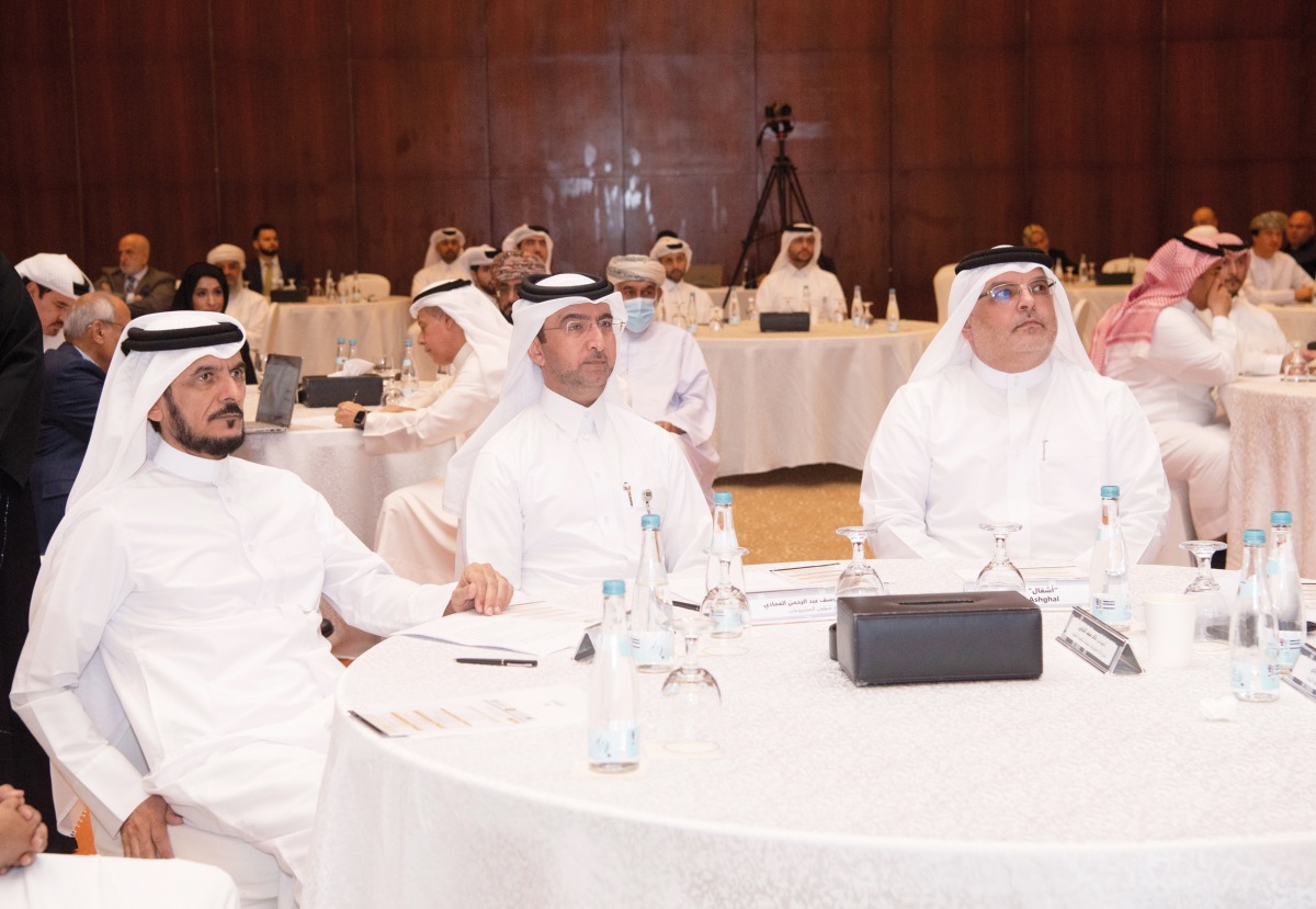 President of Ashghal H E Dr. Eng. Saad bin Ahmed Al Muhannadi (right) with other officials during the symposium. 