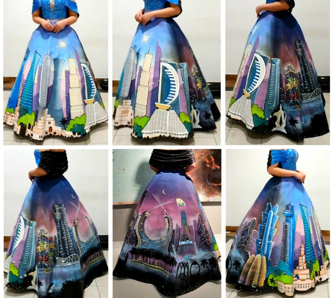 The hand-painted 'Doha Skyline Day & Night' costume by Qatar-based Filipino artist Michael Conjusta.