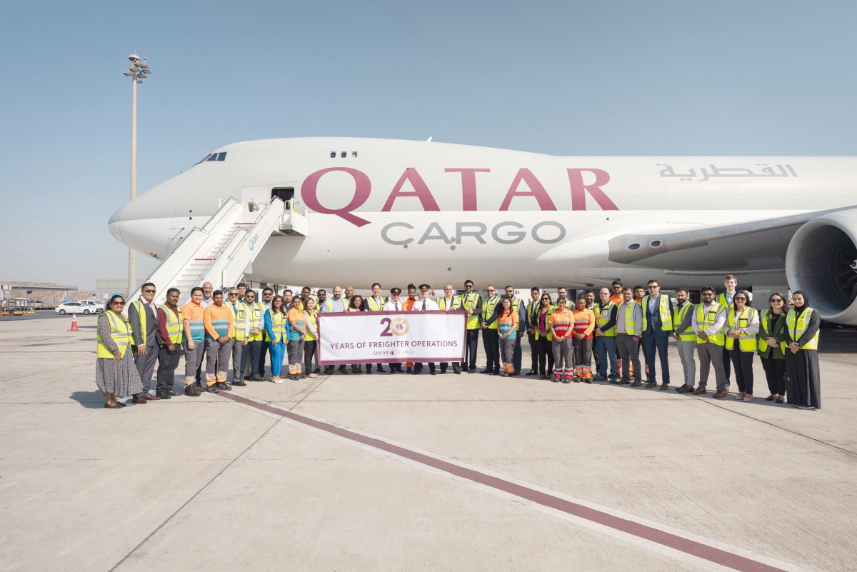 Qatar Airways Cargo staff celebrating two decades of operations.