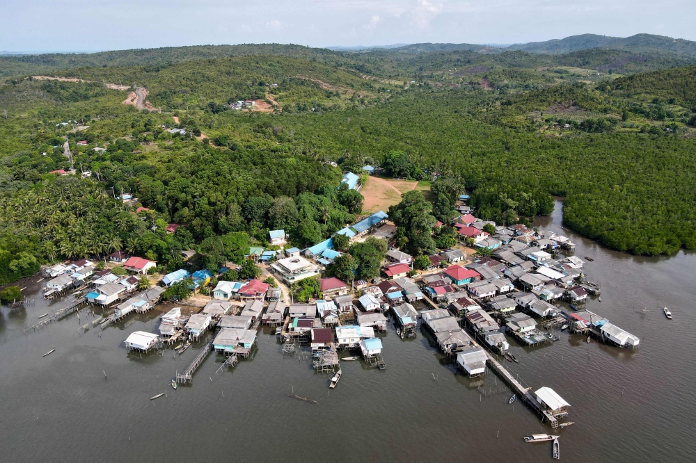 This aerial photo taken on September 18, 2023 shows Monggak village on Rempang Island. (Photo by Bay Ismoyo / AFP)