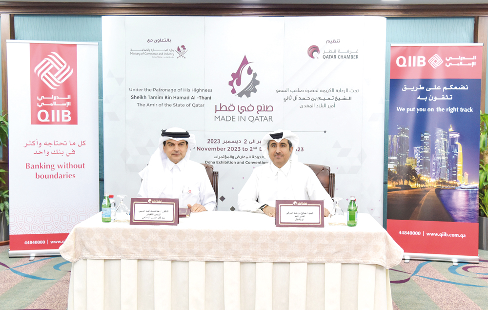 QIIB CEO, Dr Abdulbasit Ahmed Al Shaibei and Qatar Chamber General Manager and Chairperson of the Exhibition’s Technical Committee, Saleh bin Hamad Al Sharqi during the signing ceremony.