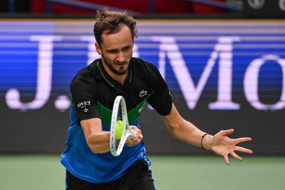 Russia's Daniil Medvedev hits a return to USA's Sebastian Korda during their men's singles match at the Shanghai Masters tennis tournament in Shanghai on October 8, 2023. Photo by Hector RETAMAL / AFP