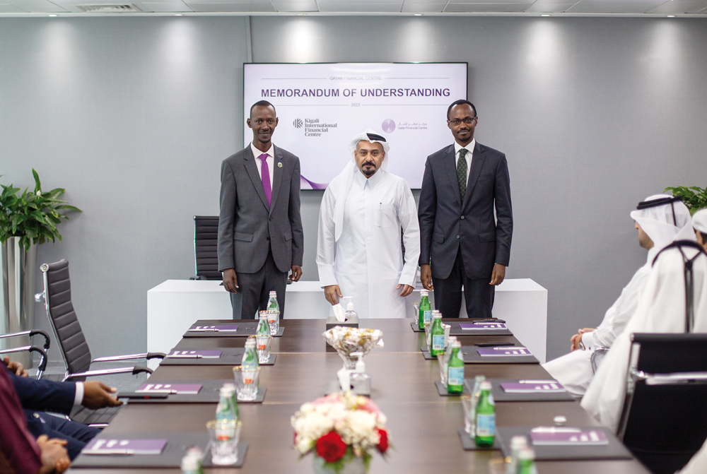 QFC CEO, Yousuf Mohamed Al Jaida (centre) and Rwanda Finance Limited, CEO Nick Barigye during the MoU signing.