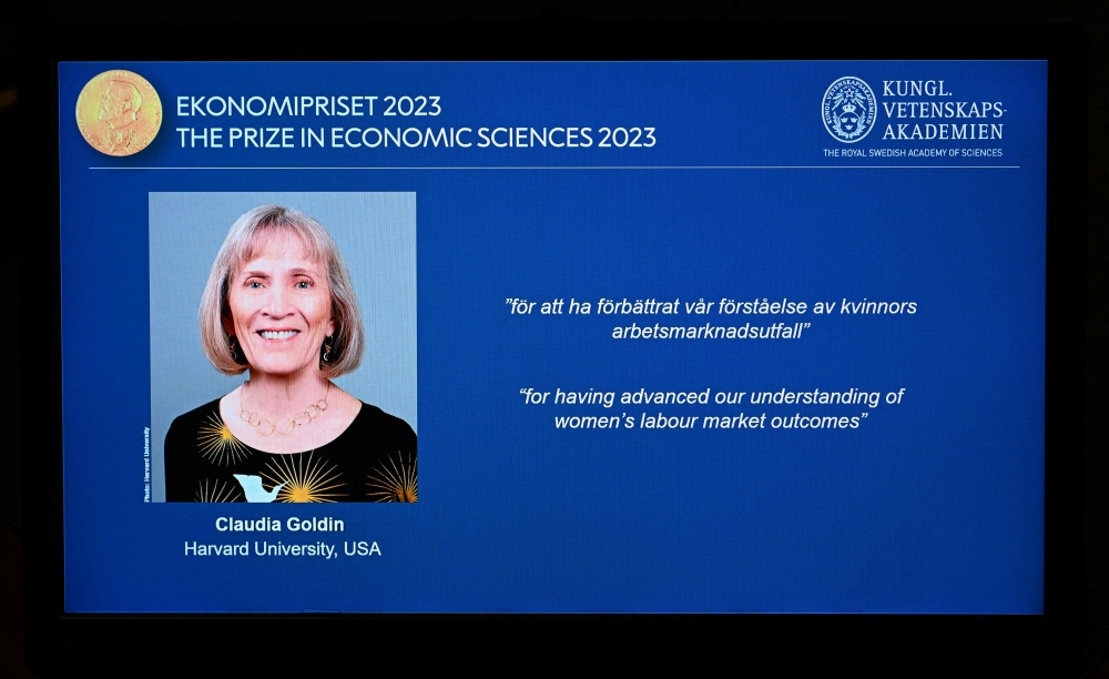 The winner of the 2023 Prize in Economic Sciences in Memory of Alfred Nobel American economist Claudia Goldin is seen on a display during a press conference at the Royal Swedish Academy of Sciences in Stockholm, Sweden, on October 9, 2023. (Photo by Jonathan Nackstrand / AFP)