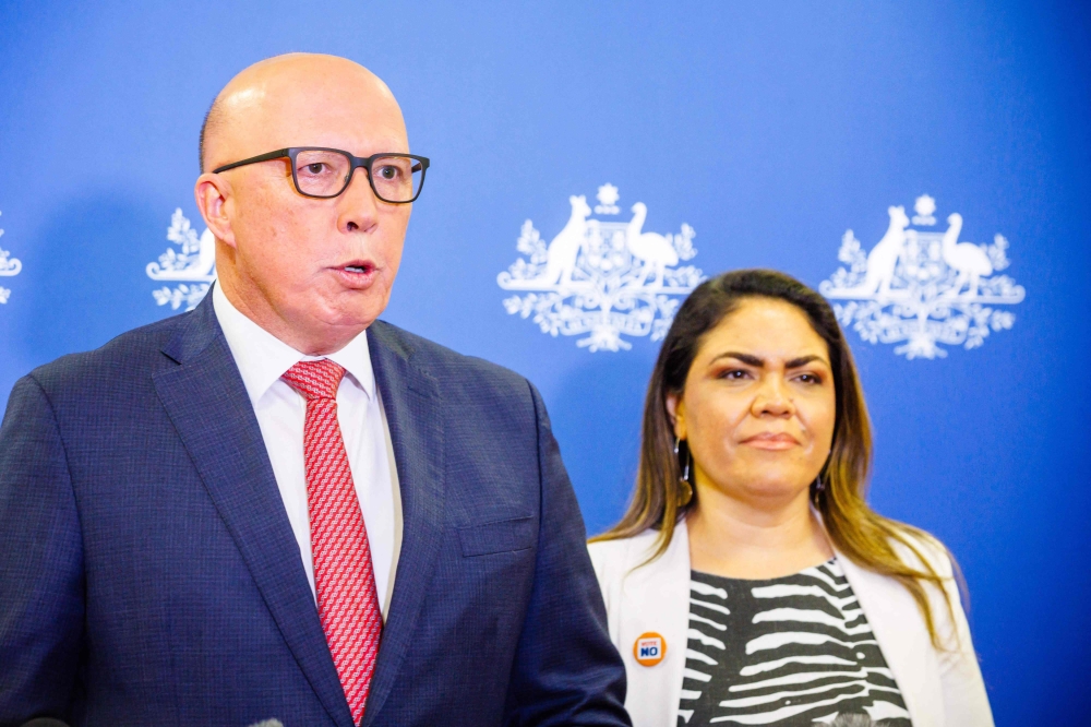 Shadow minister for Indigenous Australians Jacinta Nampijinpa Price (R) and Opposition Leader Peter Dutton attend a press conference following the results of Australia's historic Indigenous rights referendum, in Brisbane on October 14, 2023. (Photo by Patrick Hamilton / AFP)