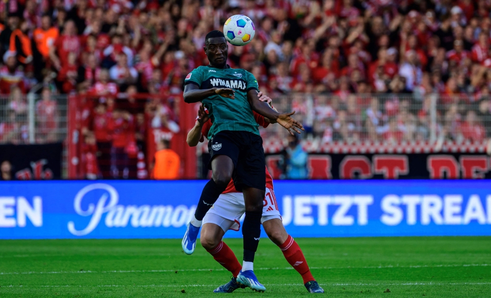 Stuttgart's Guinean forward #09 Serhou Guirassy (front) vies with Union Berlin's German defender #31 Robin Knoche during the German first division Bundesliga football match between Union Berlin and VfB Stuttgart in Berlin, Germany on October 21, 2023. Photo by John MACDOUGALL / AFP