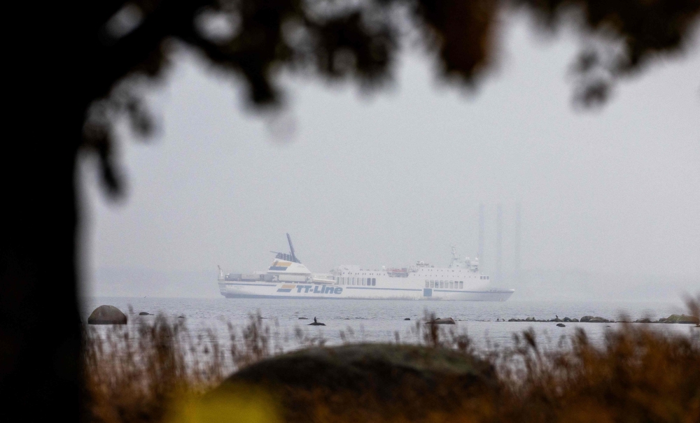 The grounded ferry Marco Polo causing a large oil spill is pictured on October 31, 2023 off the coast of Hoervik, Sweden. Photo by Andreas HILLERGREN / TT News Agency / AFP