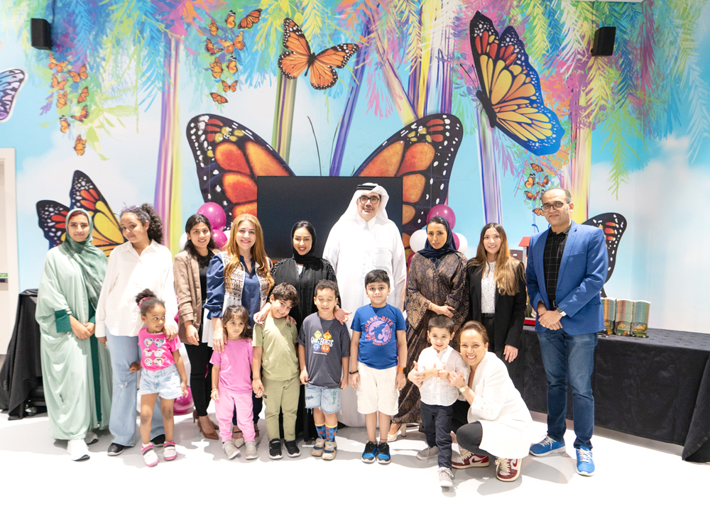 Commercial Bank officials with Qatari minors during the launch of the event.
