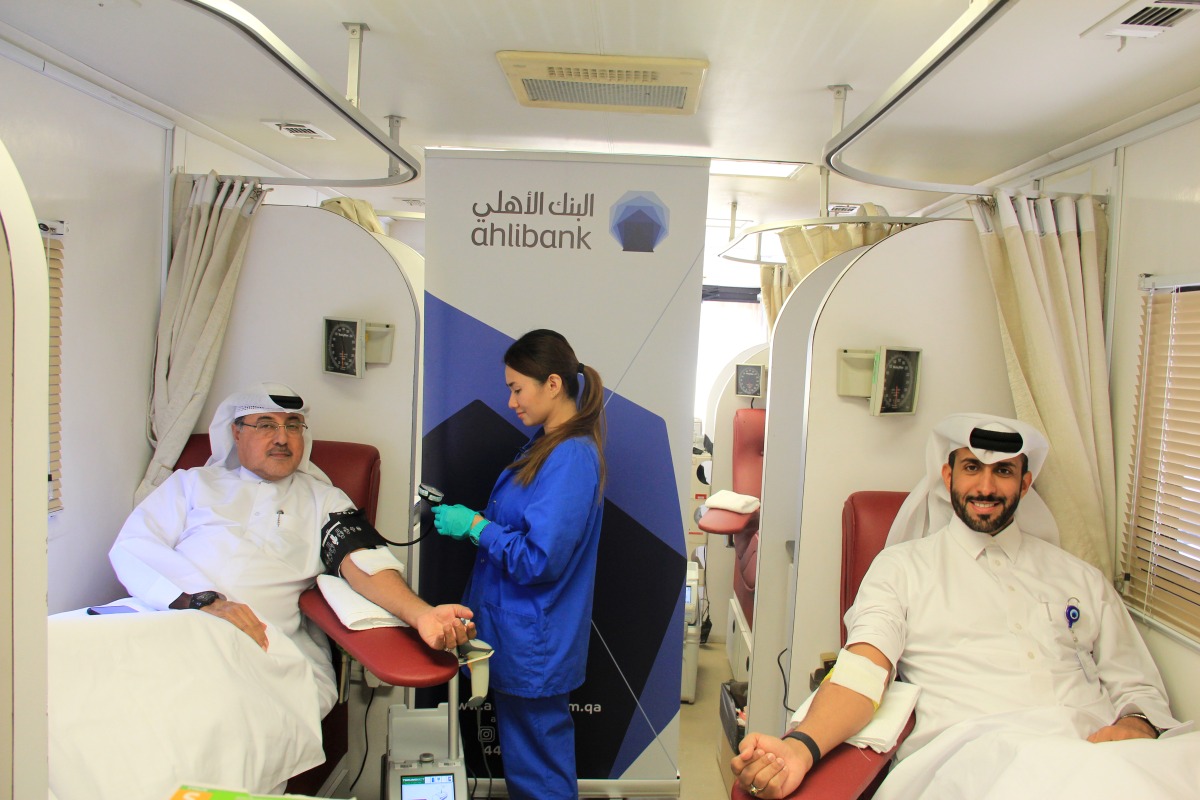 Ahlibank officials donating blood during the campaign, which was organised in cooperation with Hamad Medical Corporation.  