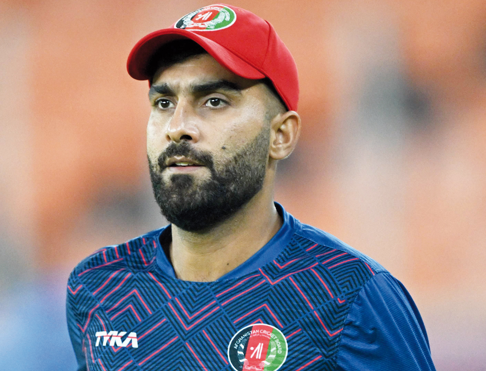 Afghanistan’s captain Hashmatullah Shahidi warms up during a practice session on the eve of their match against South Africa. AFP