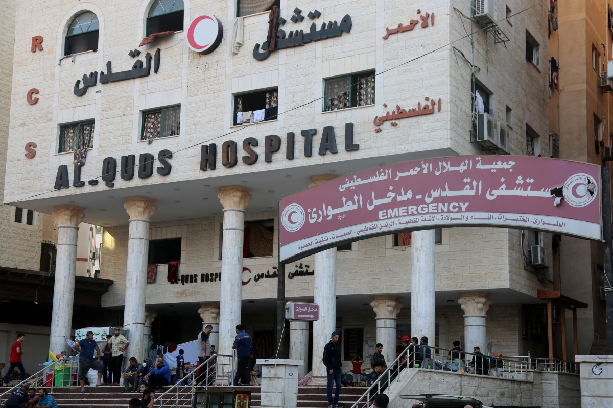 e wait outside Gaza City's Al-Quds Hospital on October 29, 2023. (Photo by Khoder al-Zaanoun / AFP)