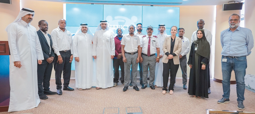 Officials pose for a group photo.