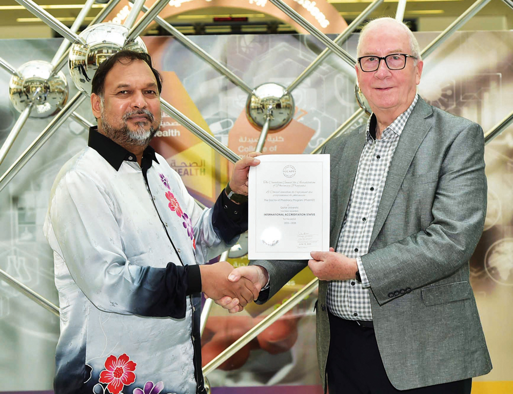 Prof. Mohamed Izham, Dean of the College of Pharmacy, and Dr. Wayne Hindmarch, CEO of CCAPP.