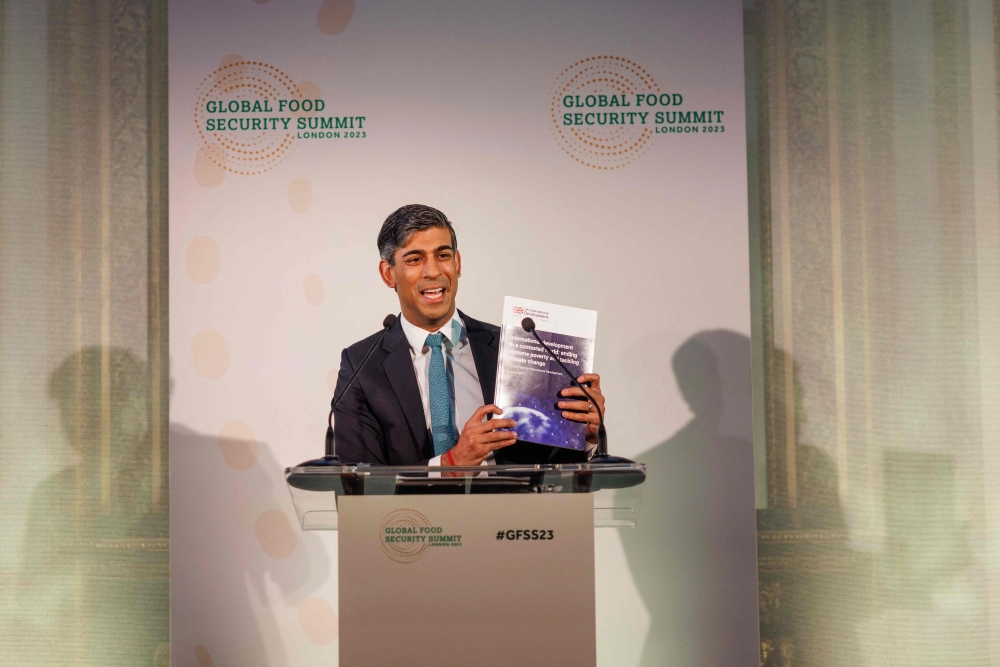 Britain's Prime Minister Rishi Sunak addresses the opening session of the Global Food Security Summit at Lancaster House in London on November 20, 2023. (Photo by Dan Kitwood / POOL / AFP)
