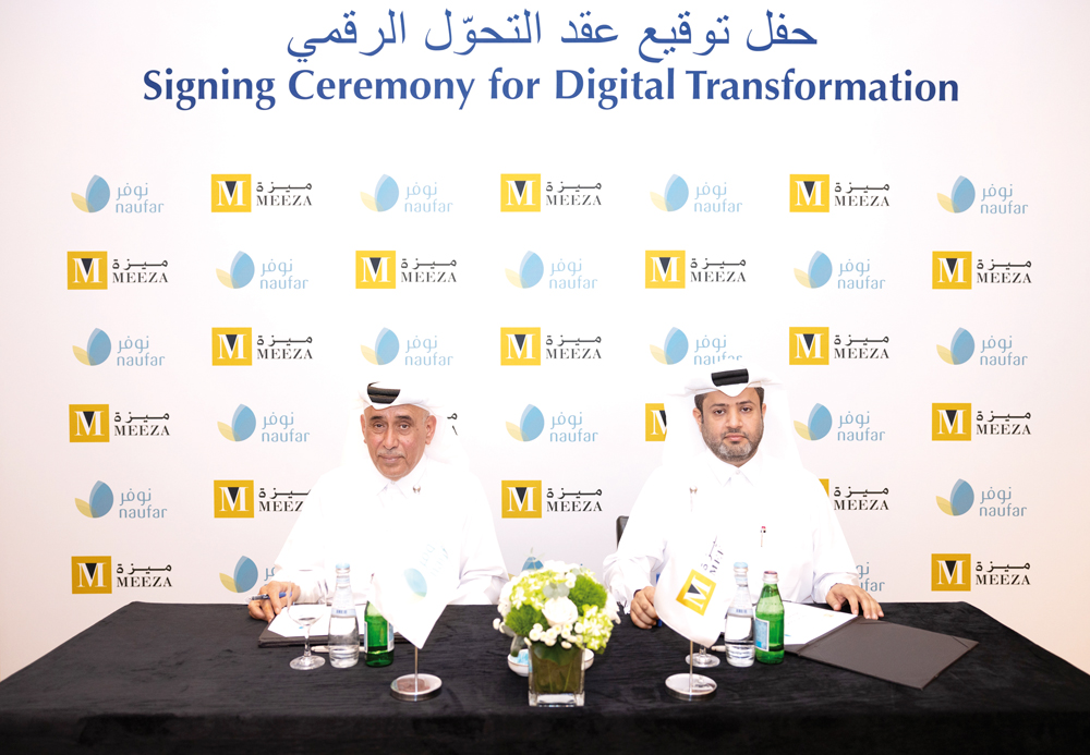 MEEZA and Naufar officials during the signing ceremony.