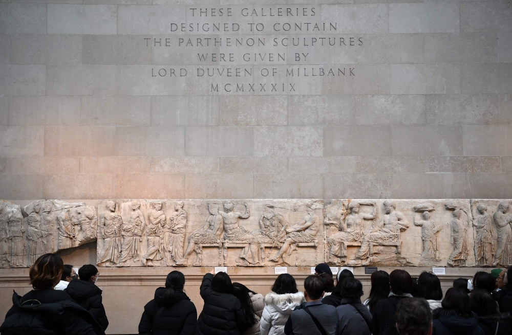 File: Visitors view the Parthenon Marbles, also known as the Elgin Marbles, at the British Museum in London on January 9, 2023. Greek Prime Minister Kyriakos Mitsotakis expressed his 