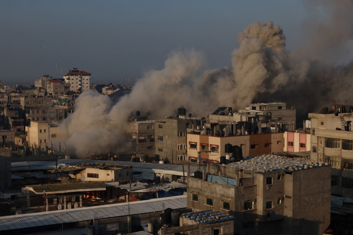 Smoke billows in Rafah following an Israeli air raid on the southern Gaza Strip city on December 1, 2023. (Photo by SAID KHATIB / AFP)
