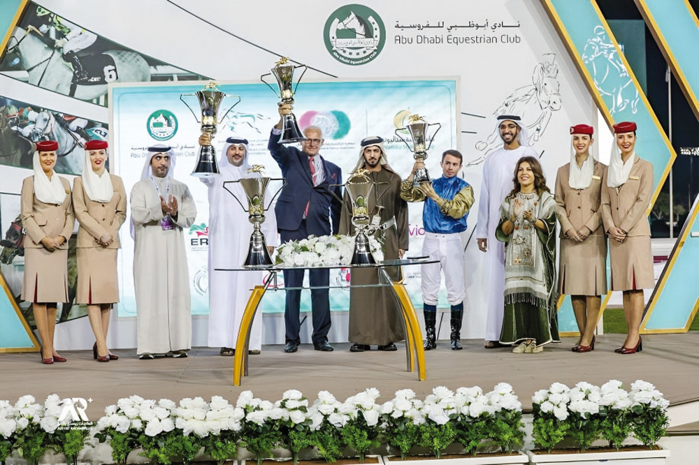 The connections of Abbes celebrate with the trophies after winning the Gr.1 (PA) Sheikh Zayed bin Sultan Al Nahyan Jewel Crown in Abu Dhabi.