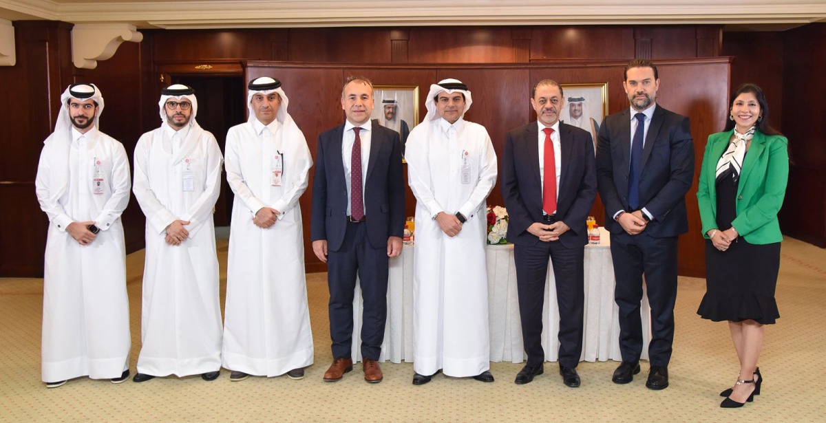 QIIB CEO Dr. Abdulbasit Ahmed Al Shaibei, Mastercard Division President, Middle East & North Africa Khalid Elgibali with other officials during the MoU signing.
