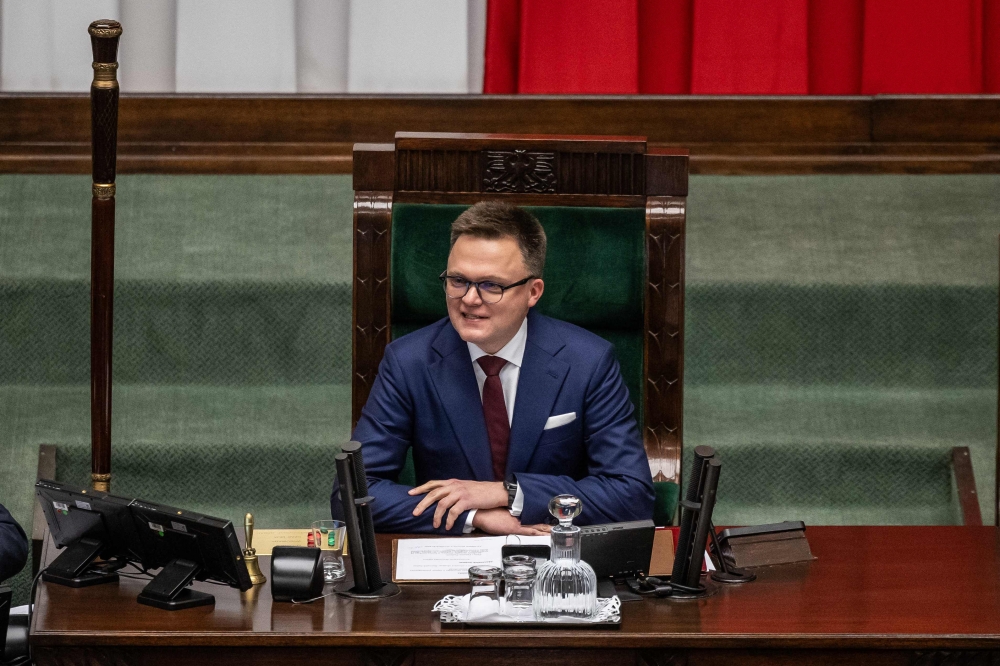 (Files) Szymon Holownia addresses the inauguration session of the Polish Parliament in Warsaw on November 13, 2023. (Photo by Wojtek Radwanski / AFP)
 
