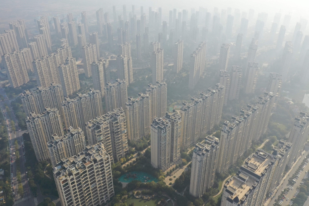 This aerial photo taken on October 31, 2021 shows buildings of China's developer Country Garden Holdings in Zhenjiang, in China's eastern Jiangsu province. Photo by STRINGER / AFP

