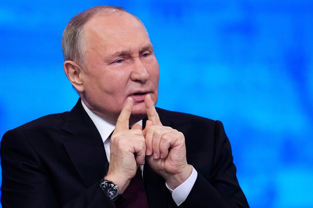 Russian President Vladimir Putin holds his year-end press conference at Gostiny Dvor exhibition hall in central Moscow on December 14, 2023. (Photo by Alexander Zemlianichenko / POOL / AFP)