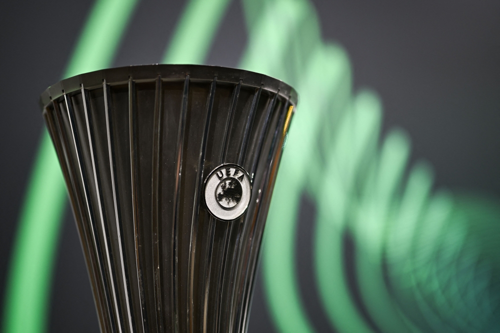 This photograph taken on December 18, 2023, shows the UEFA Europa Conference League cup before the draw for the play-offs in the knockout phase of the 2023-2024 UEFA Europa Conference League football tournament at the House of European Football in Nyon. (Photo by Fabrice COFFRINI / AFP)
