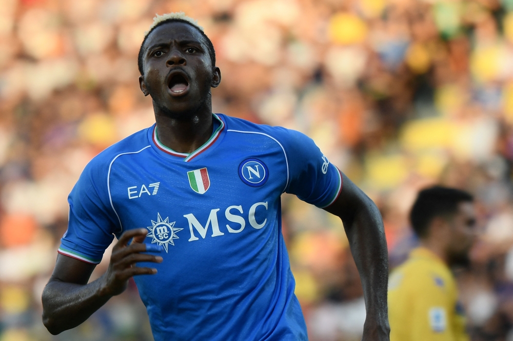 (FILES) Napoli's Nigerian forward Victor Osimhen celebrates after scoring the second goal during the Italian Serie A football match Frosinone vs Napoli at the Benito Stirpe stadium in Frosinone, on August 19, 2023. (Photo by Filippo MONTEFORTE / AFP)
