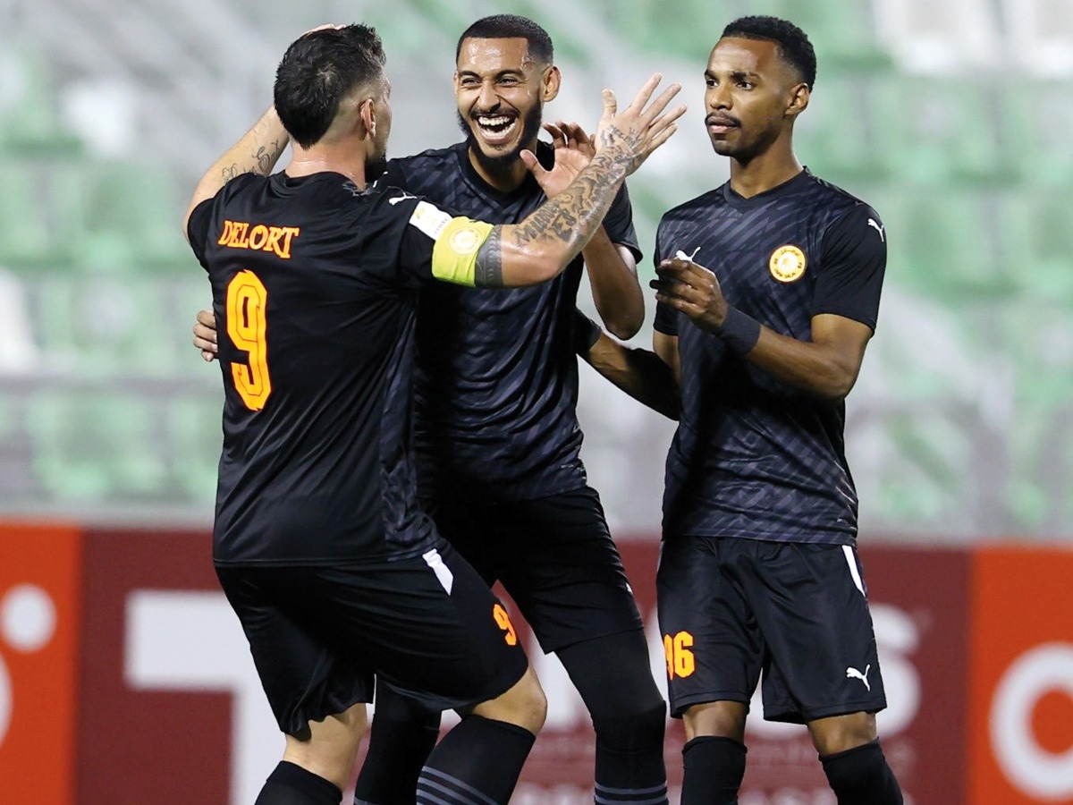 Umm Salal’s Andy Delort (left) celebrates with teammates after scoring a goal against Al Shamal yesterday.