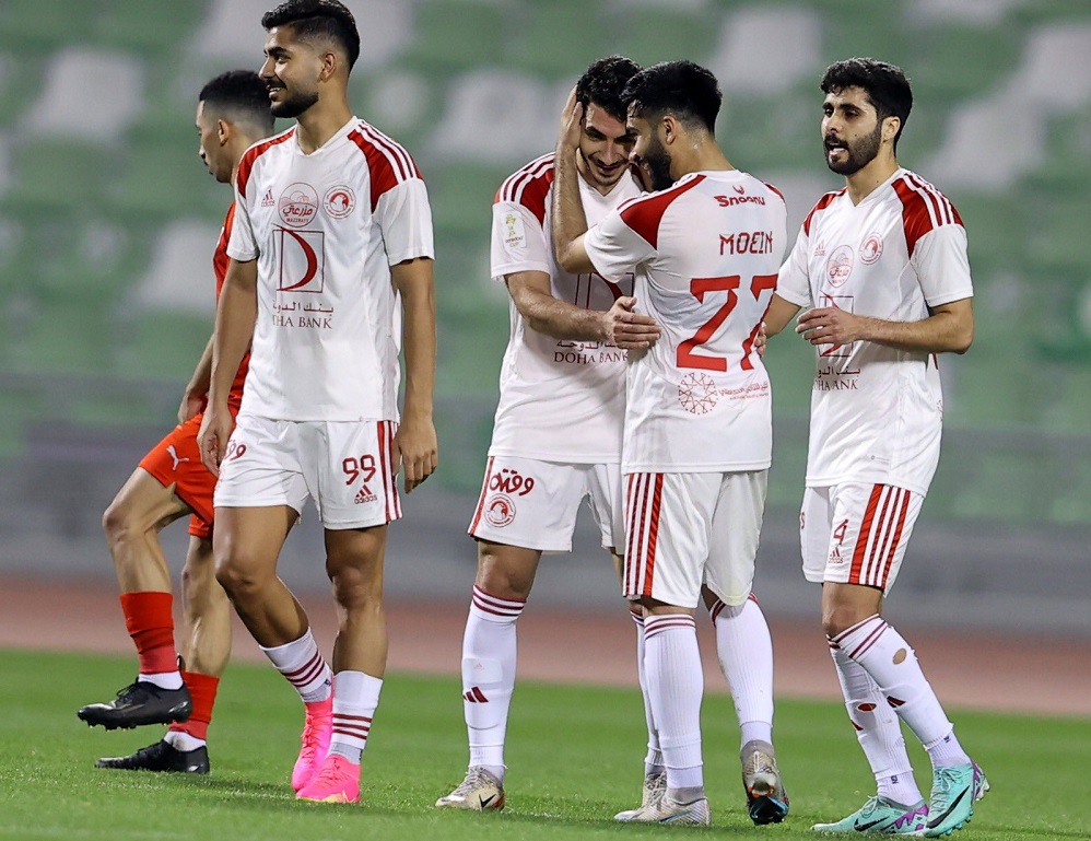 Al Arabi players celebrate during the quarter-final against Al Duhail. 