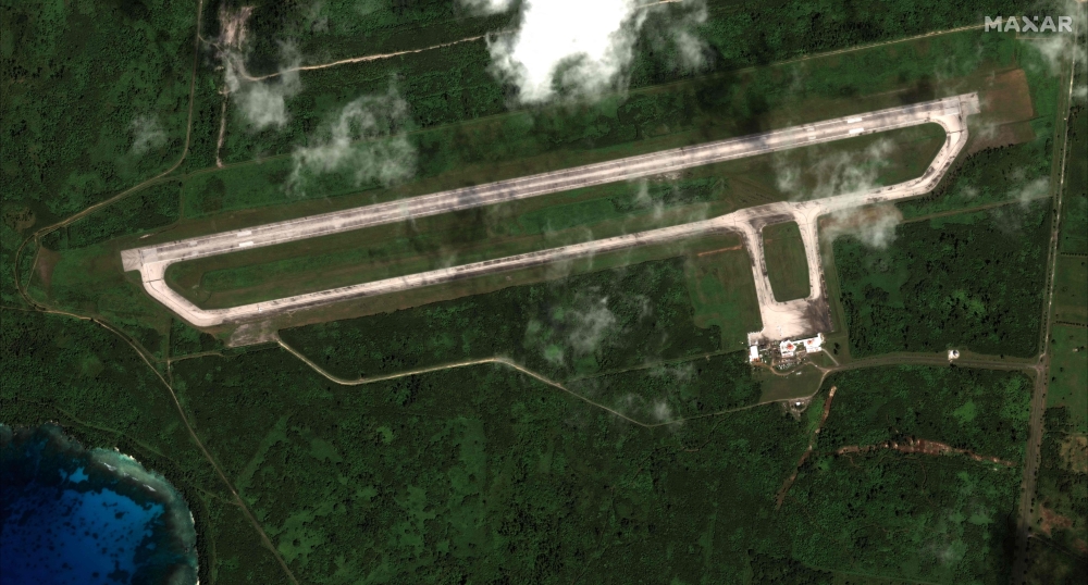 This January 10, 2022 satellite image released on December 28, 2023 by Maxar Technologies shows the Tinian airfield in the Mariana Islands. (Photo by Handout / Satellite image 2023 Maxar Technologies / AFP)