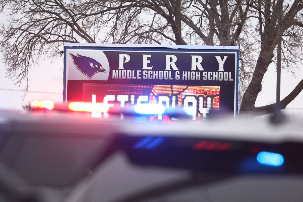 Police respond to a school shooting at the Perry Middle School and High School complex on January 04, 2024 in Perry, Iowa. Photo by SCOTT OLSON / GETTY IMAGES NORTH AMERICA / Getty Images via AFP