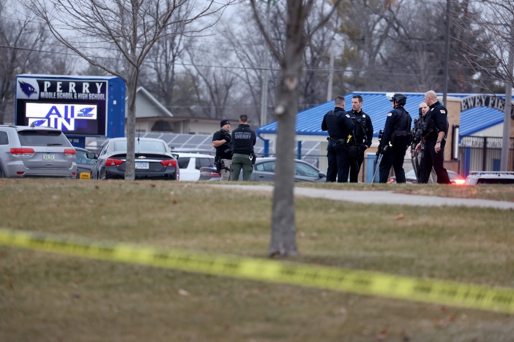 Law enforcement officials respond to a school shooting at the Perry Middle School and High School complex on January 04, 2024 in Perry, Iowa. Photo by SCOTT OLSON / GETTY IMAGES NORTH AMERICA / Getty Images via AFP