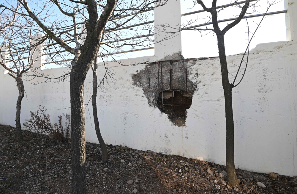 A general view shows a wall damaged by a North Korean artillery attack in late 2010 at Yeonpyeong island, near the 'northern limit line' sea boundary with North Korea, on January 6, 2024. (Photo by Jung Yeon-je / AFP)