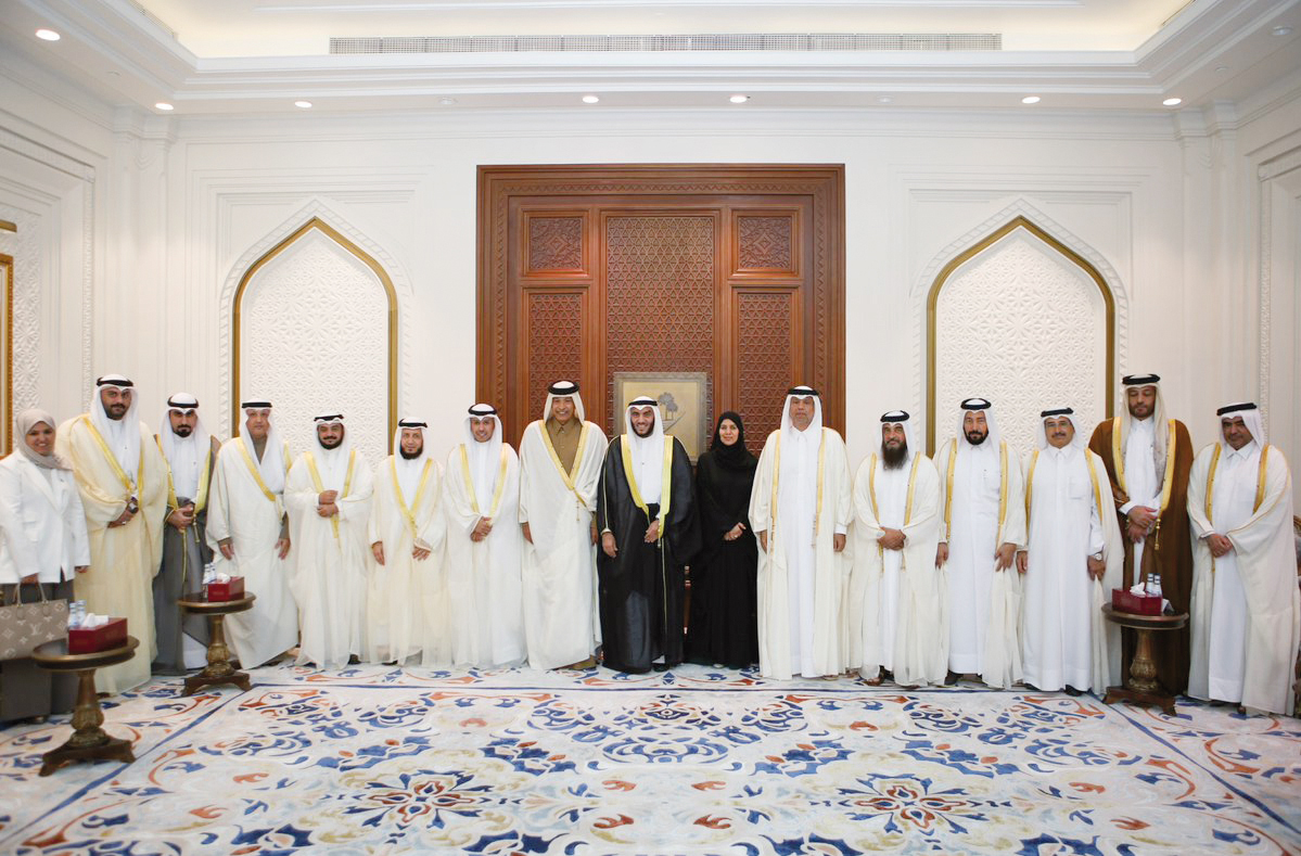 Shura Council Speaker H E Hassan bin Abdullah Al Ghanim with members of a parliamentary delegation from Kuwait and Qatari officials.   
