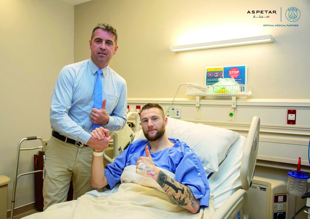 Milan Skrinair with Aspetar's Chief Medical Officer and Orthopaedic Surgeon Dr. Pieter D’Hooghe.