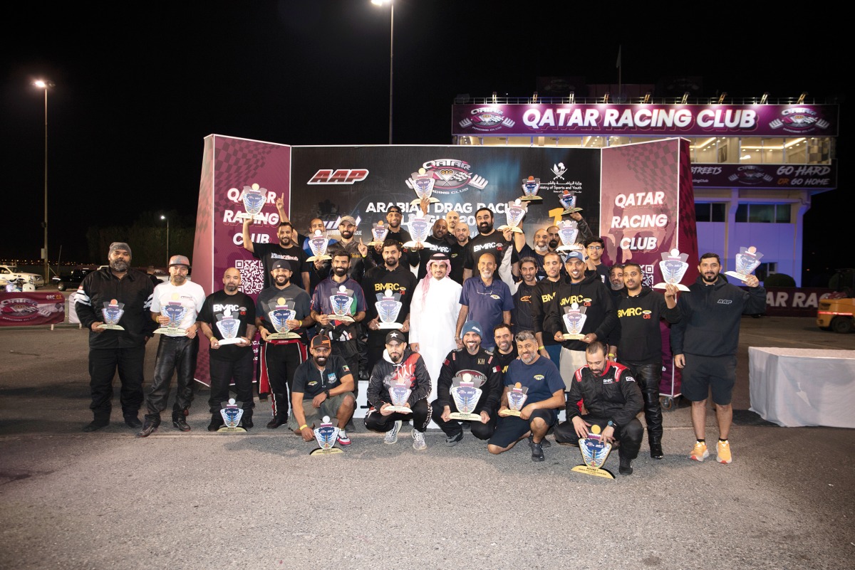Qatar Racing Club Director Sheikh Jabor bin Khalid Al Thani with the podium winners.