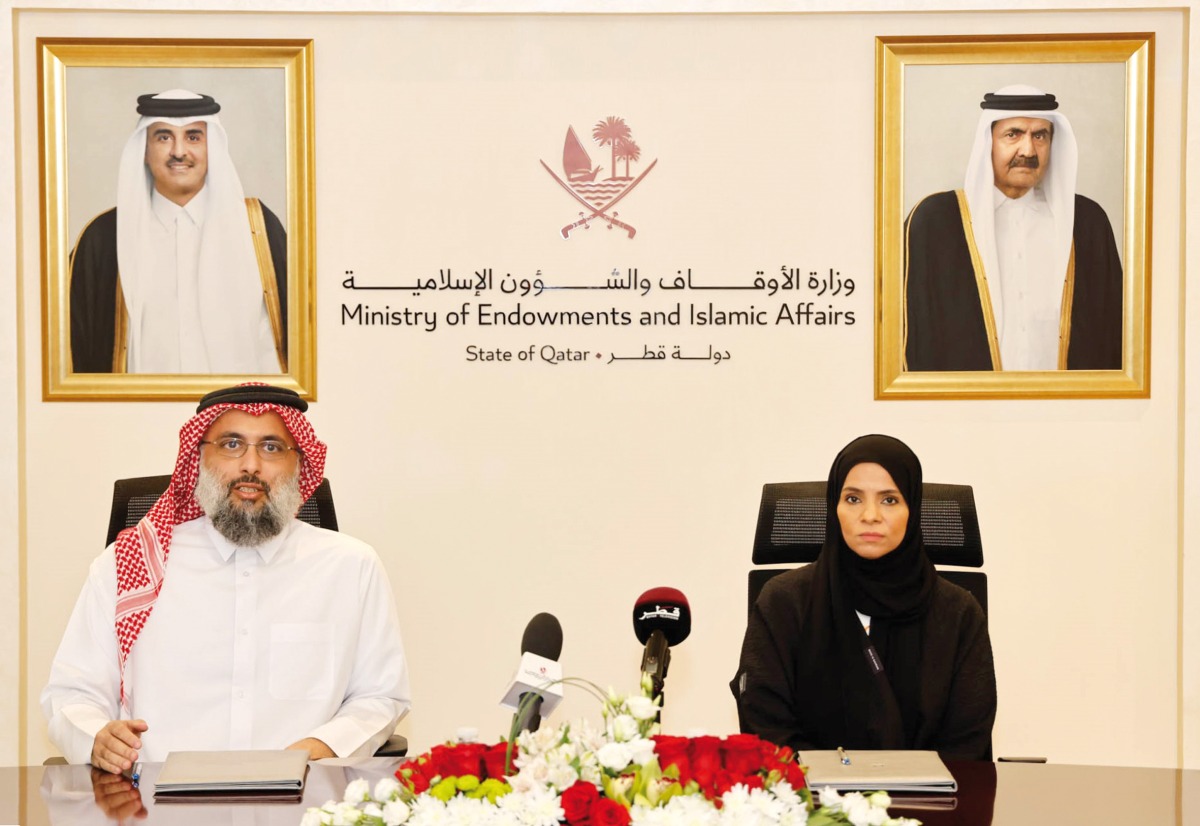 Director of the Department of Islamic Research and Studies at the Ministry  of Awqaf and Islamic Affairs Sheikh Dr. Ahmed bin Mohammed bin Ghanem Al Thani (left), and Director of Research and Learning at QNL, Abeer Al Kuwari addressing a press conference yesterday.