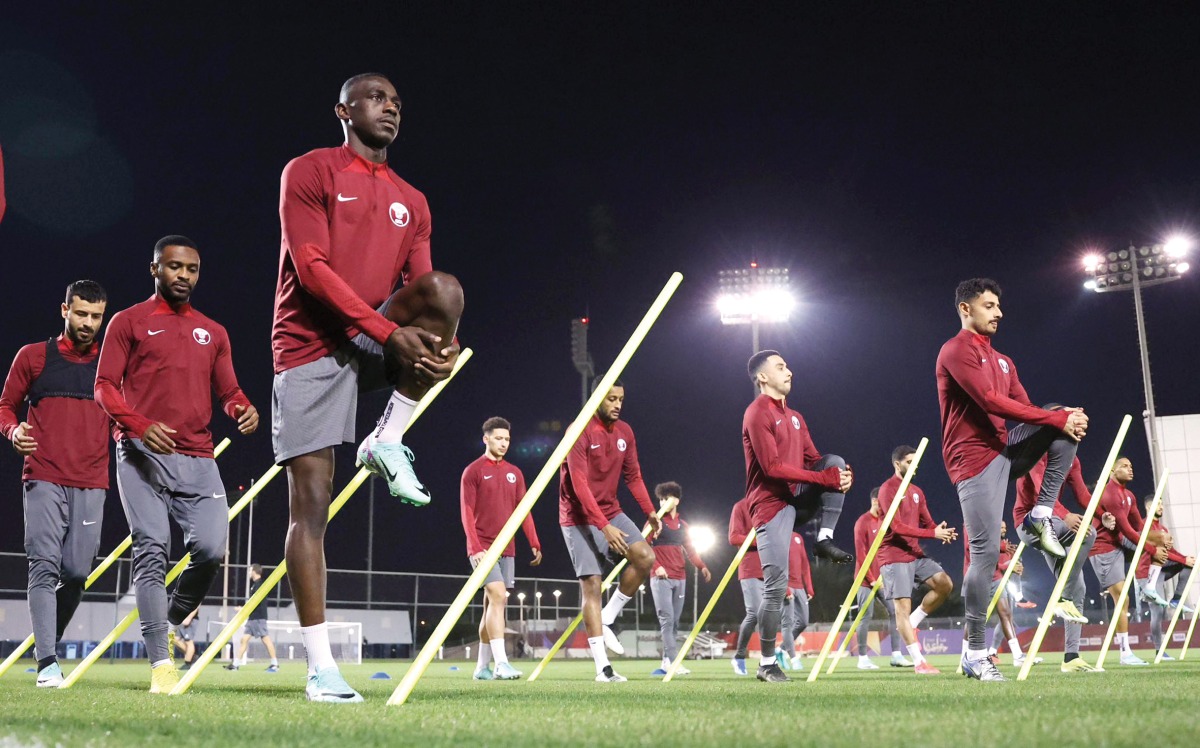 Qatar players during a training session as they prepare for their second Asian Cup Group A match against Tajikistan yesterday. 