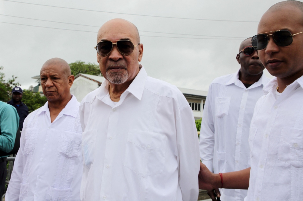 File: Suriname former President Desi Bouterse leaves the High Court of Justice after his appeal case against the Court Martial sentence of 20-year jail for his involvement in the murder of 15 people when he ruled in 1982 during his military government, in Paramaribo on January 5, 2023. (Photo by Ranu Abhelakh / AFP)