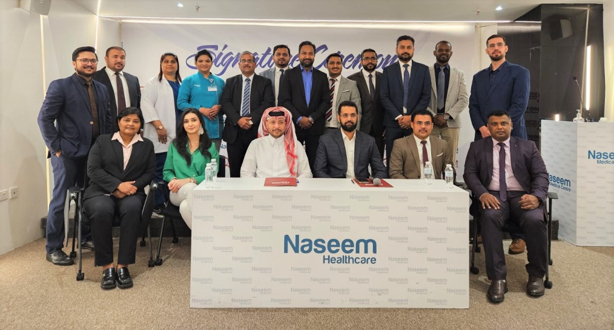 Officials of Qatar Cricket Association and Naseem Al Rabeeh Healthcare Group pose for a group photo.
